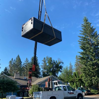 swim spa delivery by crane and the Country Homes Power spa team
